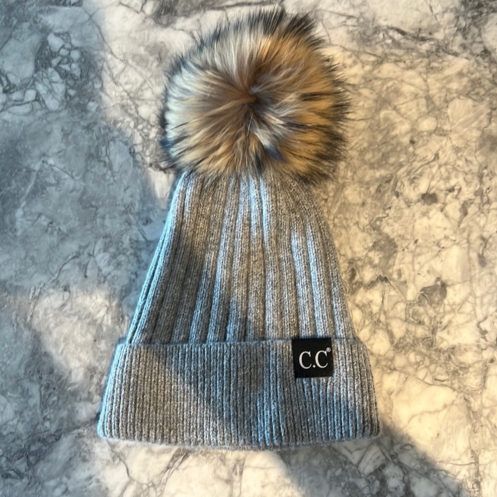 Knit beanie with fur Pom Pom